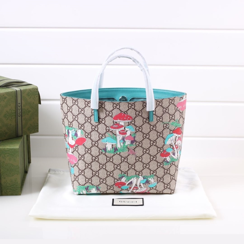 G*u*i shopping bags